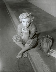 55249957 Photo by Ernst Bachrach on the set of 'Clash by Night', 1952. Note Marilyn's copy of 'The Thinking Body', a book recommended to her by Michael Chekhov.