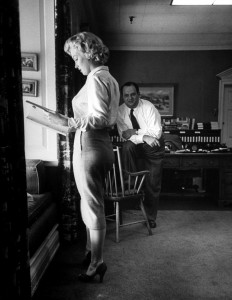 Marilyn discusses her role in 'Clash by Night' with Jerry Wald in his office. Photo by Bob Landry, September 1951.