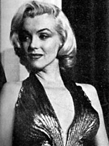 Marilyn in her gold Travilla dress, 1953