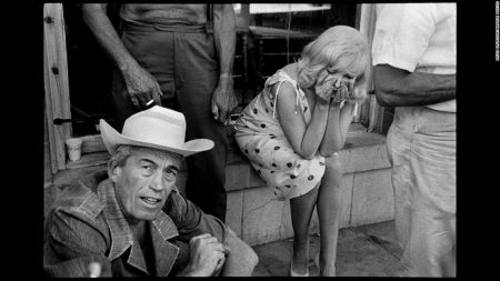 Director John Huston with Marilyn during filming of 'The Misfits', 1960